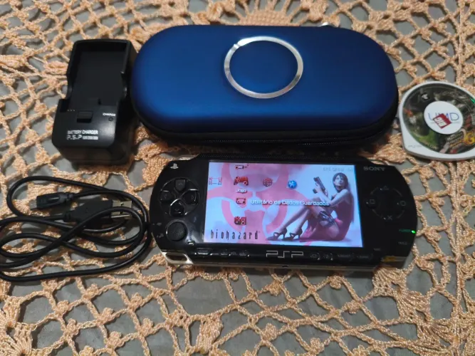 Psp modelo 1001 desbloqueado com 1 jogo em UMD!!