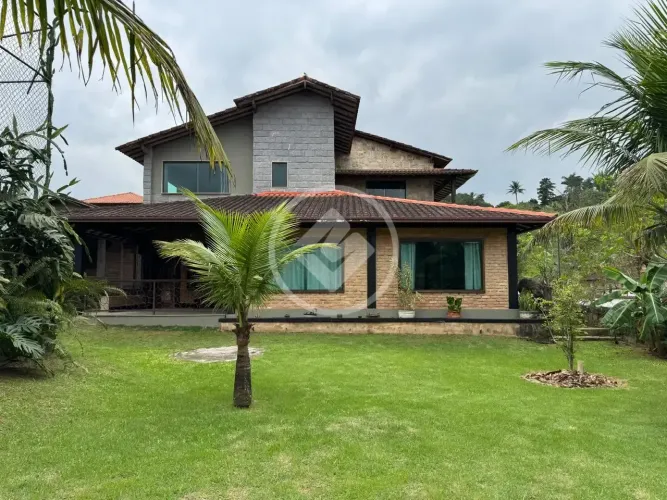 Casa de condomínio - 1.400m2 de terreno plano - 568m2 de área construída - 4 suítes - Cane