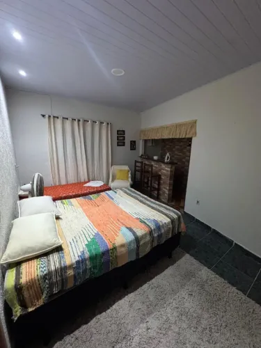 Aluguel de quartos para temporada 60 reais a diária  por pessoa 