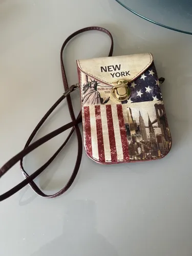 Bolsinha comprada em Nova York, nova