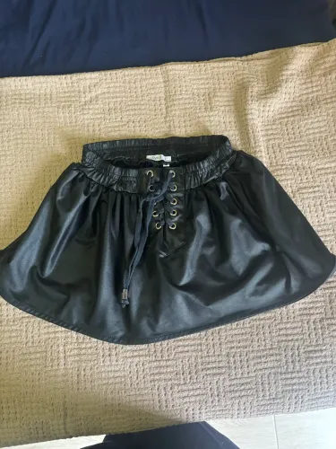 Lote 8 peças (saias/shorts)