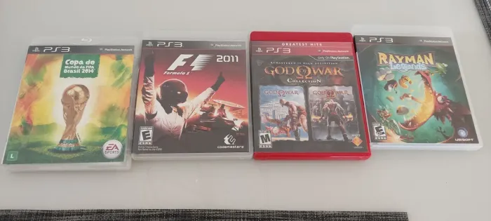 Jogos PS3 - Copa do Mundo FIFA Brasil 2014, F1 2011, God of War Collection, Rayman Legends
