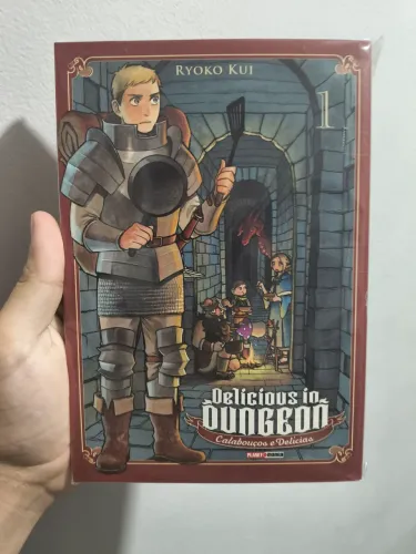 Delicious in dungeon Volume 1 com marca páginas