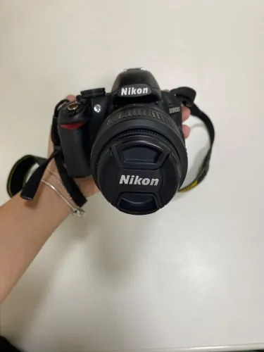 Câmera Nikon D3100 com lente 18-55 mm VR
