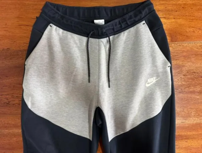 calça nike tech fleece cinza e preta