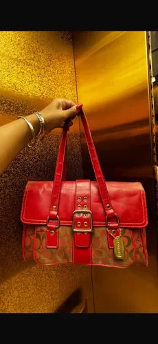 Coach original com código de veracidade
