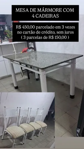 Mesa de mármore com 04 cadeiras