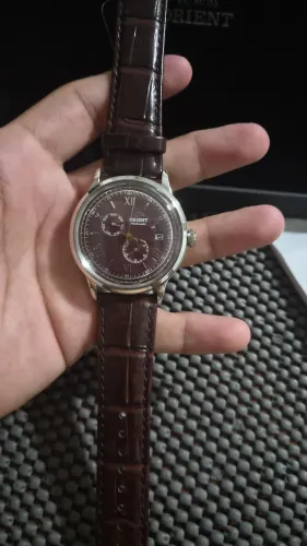 Orient bambino bege e vermelho 1999 cada