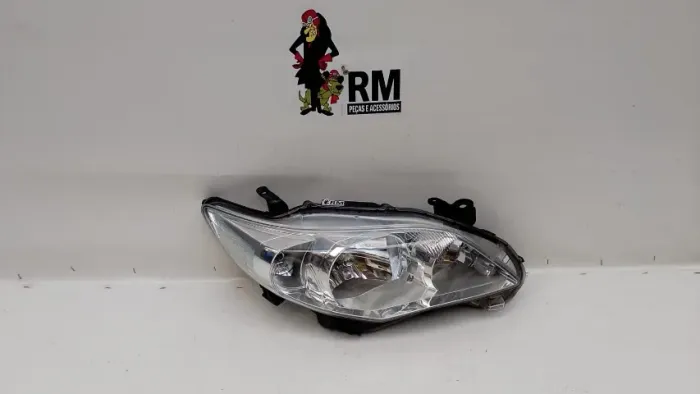 Farol Corolla 2009/2014 Mascara Cromada S/led Direito/passageiro