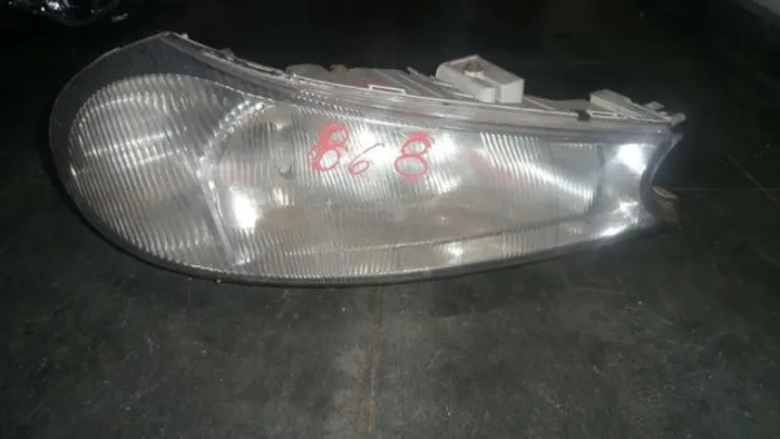 Farol direito ford modem 1997
