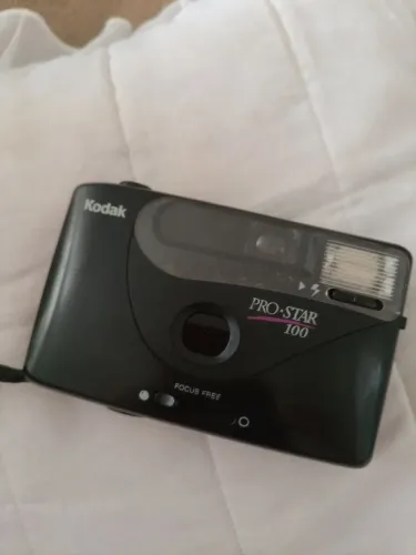 Máquina fotográfica Kodak com filme novo incluso
