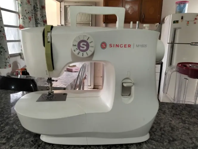 MÁQUINA DE COSTURA SINGER ?