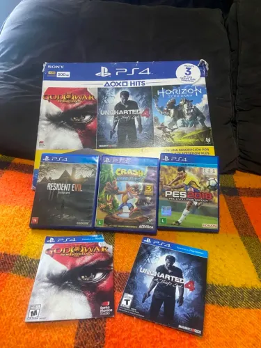 Ps4 slim 500 gb 1 controle mais 5 jogos físicos.