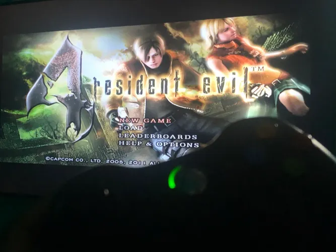 Xbox 360 slim + resident evil 4 - entrego