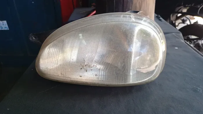 Farol Corsa Wind lado motorista original arteb lente de vidro