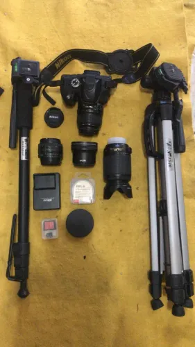 Camera nikon d-5100, vendo tudo ou lentes e assessórios separados - leia descriçã
