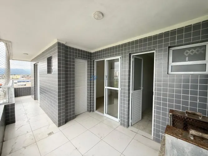 Apartamento à venda em Praia Grande no bairro Nova Mirim com 2 suítes