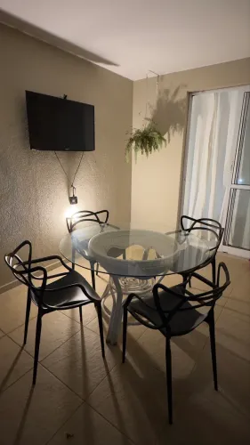 Vendo ou troco por bike Mesa tampão de vidro com 4 cadeiras 