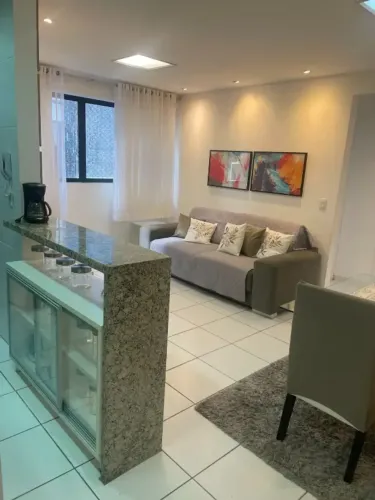 QUARTO E SALA A METROS DA PRAIA