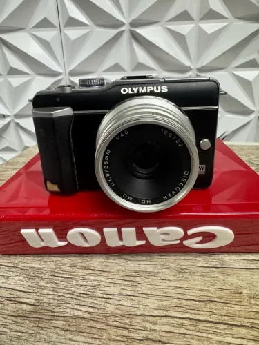 olympus pl1 + 25mm 1.8 mft 1 ano de garantia