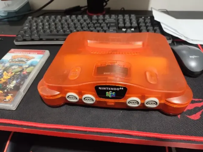 Nintendo 64 laranja translúcido - Somente o console- Possui detalhes
