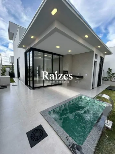 Casa em condomínio fechado com 3 suítes e varanda gourmet com 150m² em Uberlândia no Granj