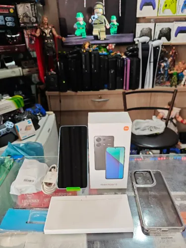 Redmi note 13 tela amoled 265gb câmera 108 MP impecável completo na cx ac trocas 