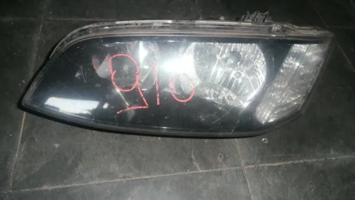 Farol esquerdo chevrolet omega 2011