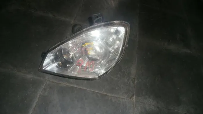 Farol esquerdo Towner 2009 2010