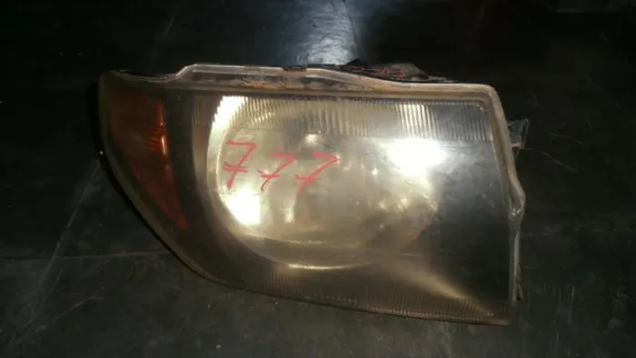 Farol direito pajero tr4
