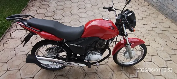 Titan 150 esi único dono
