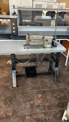 Máquina industrial de tapeceiro