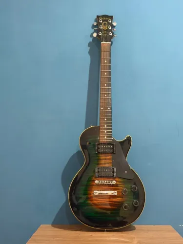 Guitarra golden les paul