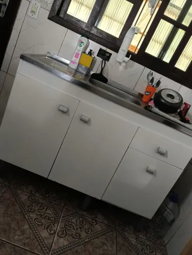 Vendo, pia com balcão e sofá cama os dois em boas condições