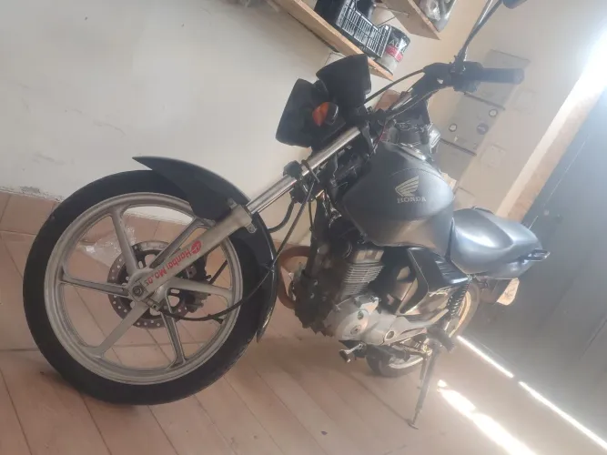 Somente venda moto super conservada .