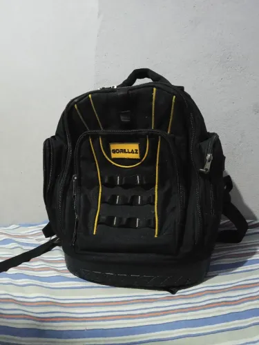 Mochila de ferramentas com defeito