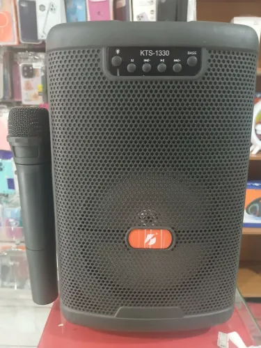 Caixa de som com microfone 