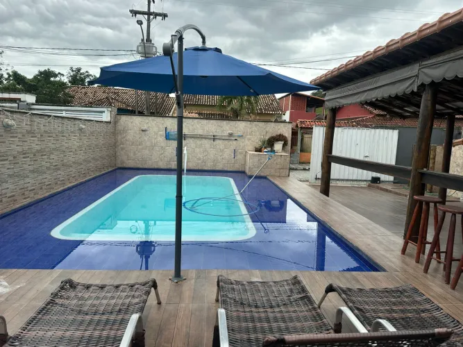 Casa à venda em Papucaia no Condomínio Jardins 1 com área gourmet e piscina
