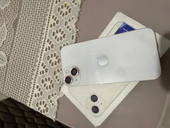 Vendo celular 13 com caixa garantia da Apple ainda. Bem conservado.