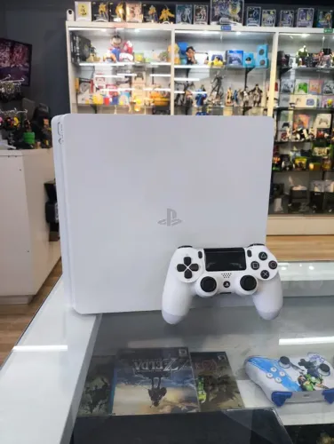 Playstation 4 slim de 500gb destravado (seminovo)