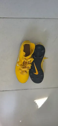 Chuteira Nike trava