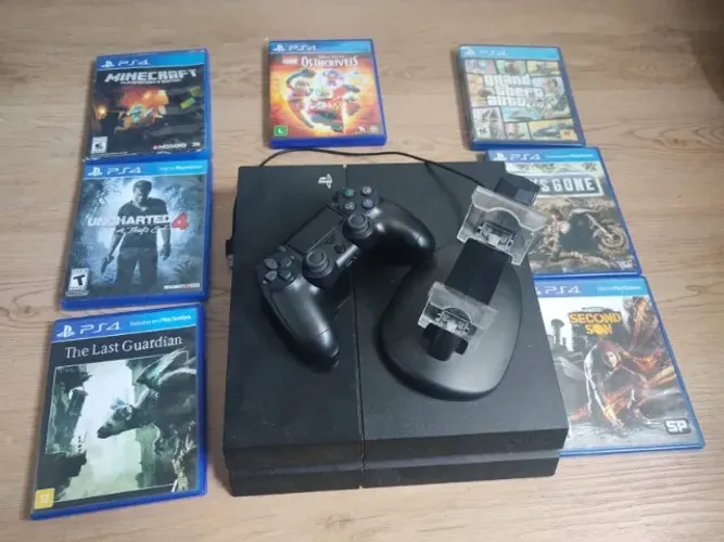 PlayStation 4 Slim com 1 controle, base carregadora e 7 jogos