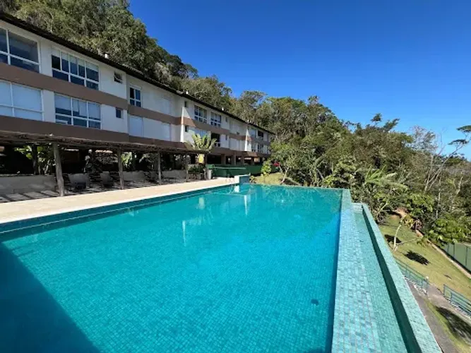Casa com 3 dormitórios para alugar, 96 m² por R$ 5.200 - Camburizinho - São Sebastião/SP