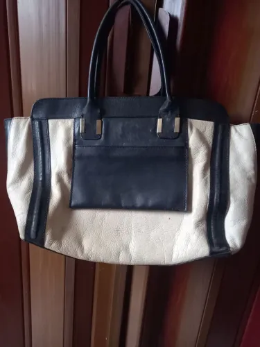 Linda bolsa de couro legítimo.