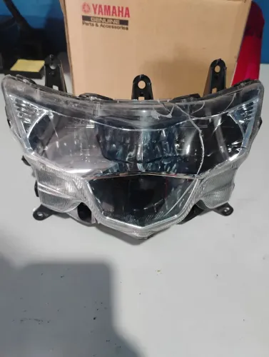 Farol da Neo 125 2023. Leia o anúncio