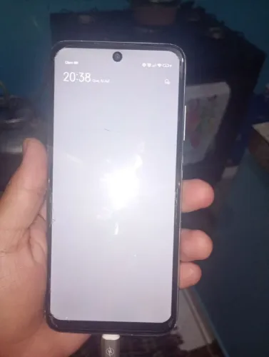 Quero vender um celular bom dia qualidade tá em ótimo estado redimi 14 branco valor 300