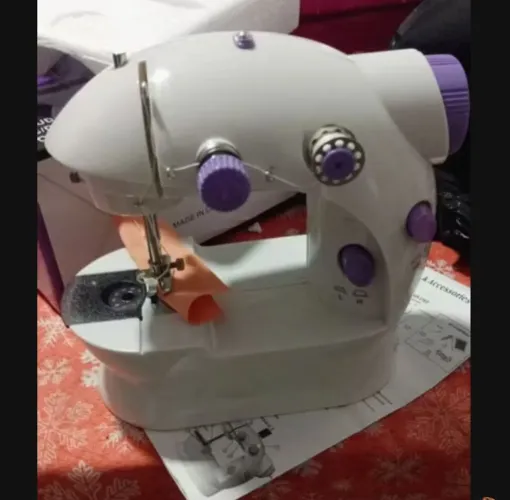Máquina de costura portátil
