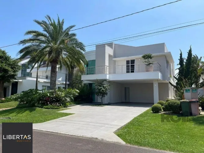 Casa de Condomínio em Atlântida Sul