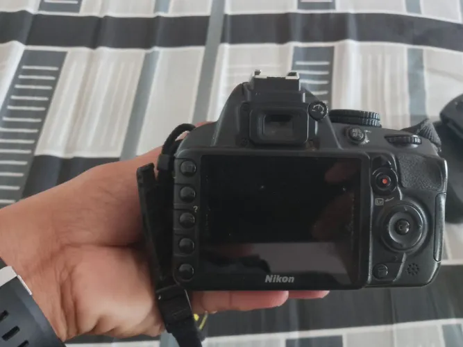 Canera Nikon 3100 com lente