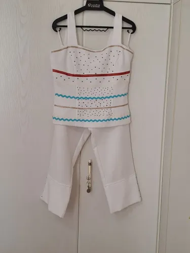 Conjunto calça e blusa. Tam. P